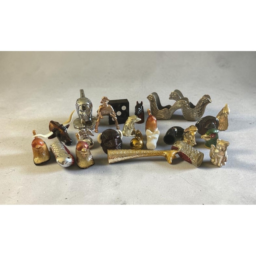 Lot of figurine heads for crafts, avon perfume tops, parts only
